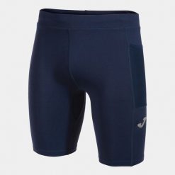 Legginsy Joma Elite X niebieskie do biegania. Niebieskie legginsy długie sportowe Joma, bez wzorów, z poliamidu, do biegania. W wyprzedaży za 150.10 zł.