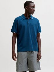 Jack & Jones Koszulka polo "Blaweston" w kolorze niebieskim rozmiar: M. Niebieskie koszulki polo Jack & Jones, m, bez wzorów, z bawełny, bez kołnierzyka, bez ramiączek. Za 74.46 zł.