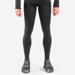 Legginsy do biegania w terenie męskie Kiprun Run 900. Czarne legginsy długie sportowe KIPRUN, m, bez wzorów, ze skóry, do biegania. Za 149.99 zł.