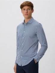 Koszula slim fit - granatowy. Niebieskie koszule Reserved, l, bez wzorów, z dzianiny, bez kołnierzyka, bez ramiączek. Za 129.99 zł.