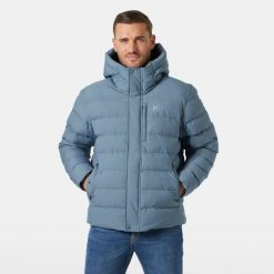 Ocieplana kurtka z kapturem Helly Hansen Alby. Niebieskie kurtki Helly Hansen, bez wzorów, z puchu, z kapturem. W wyprzedaży za 1,021.50 zł.