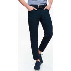 SPODNIE MĘSKIE Z TKANINY PREMIUM O KROJU SLIM. Spodnie materiałowe TOP SECRET. W wyprzedaży za 54.99 zł.