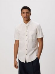 Bawełniana koszula regular fit - złamana biel. Koszule Reserved, l, bez wzorów, z bawełny, bez kołnierzyka, bez ramiączek. Za 99.99 zł.