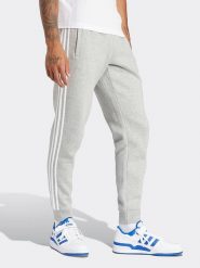 Adidas Spodnie dresowe w kolorze jasnoszarym rozmiar: XXL. Szare spodnie treningowe długie Adidas, xxl, bez wzorów, z dresówki. Za 159.21 zł.
