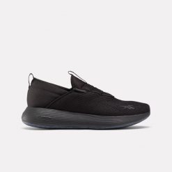 Buty sportowe męskie Reebok DMX Comfort Slip-On sneakersy treningowe czarne. Czarne buty turystyczne Reebok, bez wzorów, bez zapięcia, trekkingowe. Za 249.00 zł.
