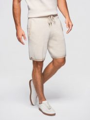 Szorty męskie dzianinowe z regulacją w pasie - beżowe V1 - Rozmiar: S. Brązowe szorty Ombre Clothing, m, bez wzorów, z bawełny, wizytowe. W wyprzedaży za 174.99 zł.