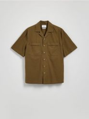 Koszula regular z dodatkiem lnu - jasny zielony. Zielone koszule Reserved, l, bez wzorów, z bawełny, bez kołnierzyka, bez ramiączek. Za 129.99 zł.