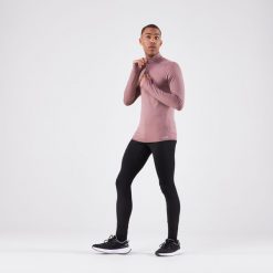 Legginsy do biegania męskie Kiprun Run 100 ocieplane. Czarne legginsy długie sportowe KALENJI, l, bez wzorów, z elastanu, do biegania. Za 79.99 zł.