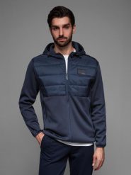 Lekka kurtka męska z łączonych materiałów z kapturem i ozdobnym pikowaniem – granatowa V4 OM-JANP-0160 - XXL. Niebieskie kurtki Ombre Clothing, l, z aplikacjami, z gumy, z kapturem. W wyprzedaży za 139.99 zł.