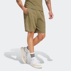 Spodenki fitness męskie ADIDAS. Zielone szorty Adidas, m, bez wzorów, z bawełny, sportowe. Za 119.99 zł.