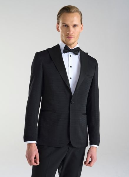 PAKO LORENTE – Czarna marynarka smokingowa w mikrowzór. Czarne garnitury Pako Lorente, na ślub cywilny, bez wzorów, z poliesteru. Za 999.99 zł.