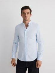 Koszula slim z bawełny egipskiej - niebieski. Niebieskie koszule Reserved, l, bez wzorów, z bawełny, bez kołnierzyka, bez ramiączek. W wyprzedaży za 109.99 zł.