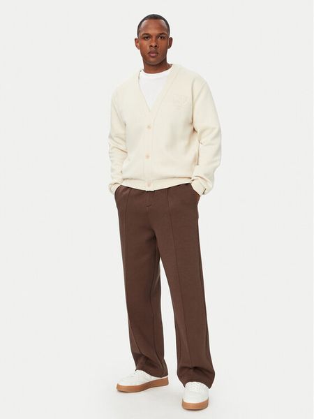 Guess Kardigan Z6YQ19 K4989 Kremowy Regular Fit. Białe swetry rozpinane Guess, m, z aplikacjami, z bawełny, bez kołnierzyka, bez ramiączek. Za 394.99 zł.