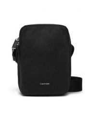 Calvin Klein Saszetka Business Tech Reporter Xs K50K512888 Czarny. Czarne saszetki i nerki CALVIN KLEIN, bez wzorów, z materiału. Za 229.99 zł.