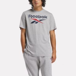 Koszulka fitness męska Reebok krótki rękaw. Szare bluzki z długim rękawem Reebok, m, bez wzorów, z bawełny, bez kołnierzyka, bez ramiączek. W wyprzedaży za 59.99 zł.