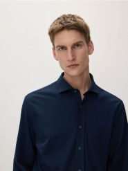 Dzianinowa koszula slim fit - granatowy. Niebieskie koszule Reserved, l, bez wzorów, z bawełny, bez kołnierzyka, bez ramiączek. W wyprzedaży za 99.99 zł.