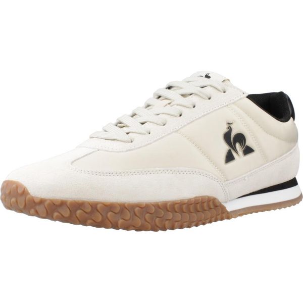 Buty LE COQ SPORTIF VELOCE I Beżowy. Brązowe buty sportowe casual le coq sportif, bez wzorów, z tkaniny, bez zapięcia. Za 351.99 zł.