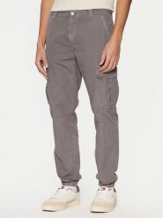 Tommy Jeans Joggery Ryan DM0DM20284 Szary Regular Fit. Szare joggery i bojówki Tommy Jeans, m, bez wzorów, z bawełny. Za 309.99 zł.