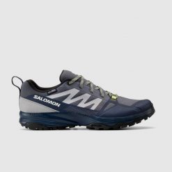 Buty turystyczne męskie Salomon Saliba wodoodporne. Niebieskie buty trekkingowe Salomon, bez wzorów, z materiału, bez zapięcia, trekkingowe. W wyprzedaży za 369.99 zł.