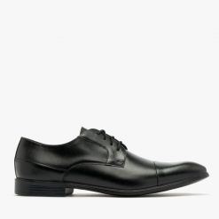 Czarne półbuty z ozdobnym przeszyciem CONNOR. Czarne eleganckie półbuty Ryłko, bez wzorów, ze skóry, bez obcasa, bez zapięcia. Za 329.99 zł.