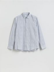 Strukturalna koszula regular fit - jasnoniebieski. Niebieskie koszule Reserved, l, bez wzorów, z bawełny, bez kołnierzyka, bez ramiączek. Za 139.99 zł.