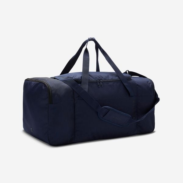 Torba sportowa Essential 75 L. Niebieskie torby na ramię Decathlon, bez wzorów, z materiału, na ramię, bez dodatków. Za 79.99 zł.