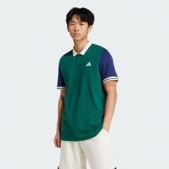 Koszulka adidas Heritage Tennis Polo. Zielone koszulki polo Adidas, m, bez wzorów, bez kołnierzyka, bez ramiączek. Za 279.00 zł.