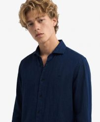 Superdry Koszula Riviera lniana z długim rękawem — 100% len, Relaxed Fit. Niebieskie koszule Superdry, na lato, l, bez wzorów, ze lnu, bez kołnierzyka, bez ramiączek. Za 267.70 zł.