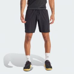Szorty Tennis Ergo. Czarne krótkie spodenki sportowe Adidas, s, bez wzorów, z elastanu. Za 224.65 zł.