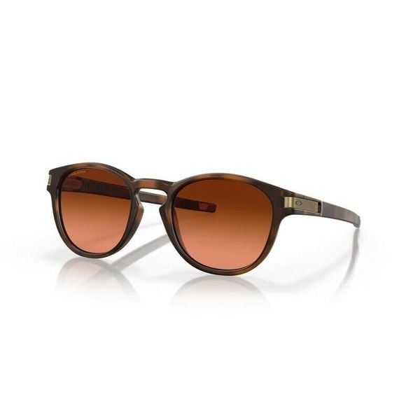 Okulary przeciwsłoneczne Oakley Latch. Brązowe okulary przeciwsłoneczne Oakley, okrągłe. Za 735.90 zł.