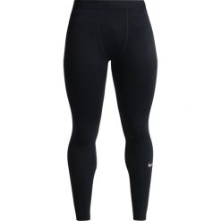 Nike Performance ZONAL STRENGTH Legginsy black/reflective silver. Spodnie treningowe długie marki Nike Performance, z elastanu. W wyprzedaży za 399.20 zł.