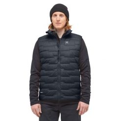 Kurtka puchowa bez rękawów Haglöfs ROC Flash Down. Czarne kurtki Haglöfs, bez wzorów, z puchu, bez kaptura. W wyprzedaży za 737.25 zł.