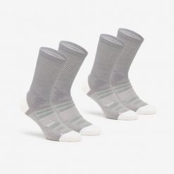 Skarpety turystyczne Hike 900 długie x2. Białe skarpety QUECHUA, bez wzorów, z elastanu. Za 79.99 zł.
