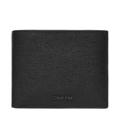 Portfel Calvin Klein. Czarne portfele CALVIN KLEIN, bez wzorów. Za 349.99 zł.