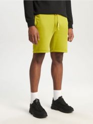 Szorty - zielony. Zielone krótkie spodenki sportowe Sinsay, l, bez wzorów, z bawełny. Za 29.99 zł.