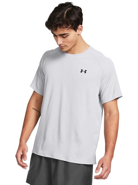 Under Armour Koszulka funkcyjna w kolorze jasnoszarym rozmiar: L. Szare t-shirty sportowe Under Armour, bez wzorów, z materiału, bez ramiączek, outdoorowe. Za 93.51 zł.