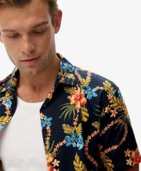 Superdry Koszula Hawaiian z nadrukiem, bawełna-modal. Niebieskie koszule Superdry, m, bez wzorów, z bawełny, bez kołnierzyka, bez ramiączek. Za 279.65 zł.