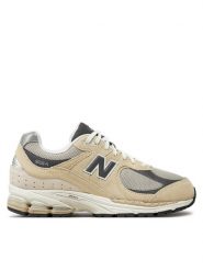 New Balance Sneakersy M2002RFA Beżowy. Brązowe buty sportowe casual New Balance, bez wzorów, z materiału, bez zapięcia. Za 449.00 zł.