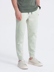 Męskie spodnie joggery dresowe na gumce z przeszyciami – miętowe V3 OM-PASK-0142 - XXL. Zielone joggery i bojówki Ombre Clothing, l, z aplikacjami, z dresówki, wizytowe. W wyprzedaży za 89.99 zł.
