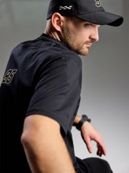 4F T-shirt regular męski 4F x Bartosz Zmarzlik - czarny L. Czarne t-shirty 4F, l, bez wzorów, z bawełny, bez kołnierzyka, bez ramiączek. Za 99.99 zł.