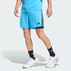 Szorty TECH ESSENTIALS WORKOUT 2 w 1. Niebieskie szorty Adidas, bez wzorów, sportowe. Za 239.00 zł.