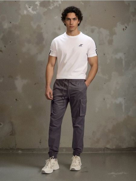 Spodnie cargo jogger - szary. Szare joggery i bojówki Sinsay, bez wzorów. Za 99.99 zł.