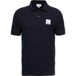 Lacoste Koszulka polo marine. Koszulki polo sportowe marki LACOSTE. Za 499.00 zł.