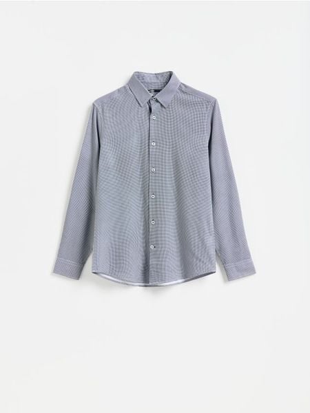 Koszula slim z drobnym printem - czarny. Czarne koszule Reserved, l, bez wzorów, z tkaniny, bez kołnierzyka, bez ramiączek. Za 129.99 zł.