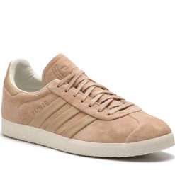 Buty adidas - Gazelle S&T AQ0893 Stpanu/Stpanu/Owhite. Brązowe buty sportowe casual marki Adidas, z materiału. W wyprzedaży za 239.00 zł.