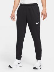 Nike Spodnie dresowe w kolorze czarnym rozmiar: M. Czarne spodnie treningowe długie Nike, m, bez wzorów, z dresówki. Za 203.45 zł.