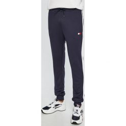 Tommy Sport - Spodnie. Niebieskie spodnie treningowe długie Tommy Sport, m, bez wzorów, z dzianiny. W wyprzedaży za 239.90 zł.