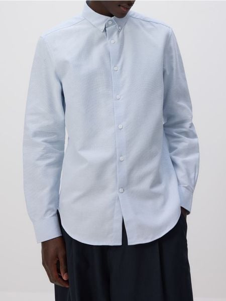 Strukturalna koszula regular fit - jasnoniebieski. Niebieskie koszule Reserved, l, bez wzorów, z bawełny, bez kołnierzyka, bez ramiączek. Za 129.99 zł.