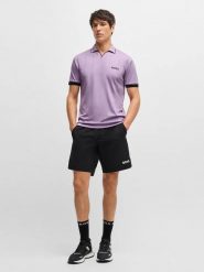 Hugo Boss Koszulka polo w kolorze fioletowym rozmiar: XL. Różowe koszulki polo HUGO BOSS, xl, bez wzorów, bez kołnierzyka, bez ramiączek. Za 369.99 zł.