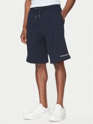 Guess Jeans Szorty sportowe M5GD49 KCPR1 Granatowy Regular Fit. Niebieskie krótkie spodenki sportowe Guess Jeans, m, z aplikacjami, z bawełny. Za 259.99 zł.